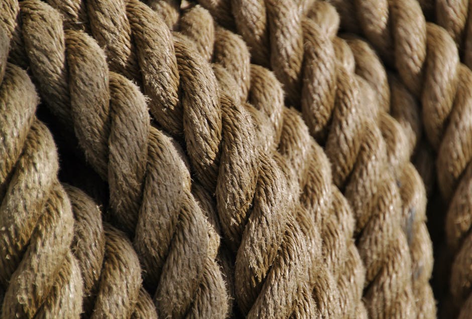 Bogensehne aus Naturfaser wird gezwirnt und gewachst
